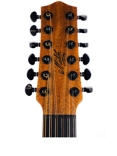 Detailed view of the neck of a Maton Mahogany Mini12 String guitar, highlighting black knobs and elegant wood grain from 2017.