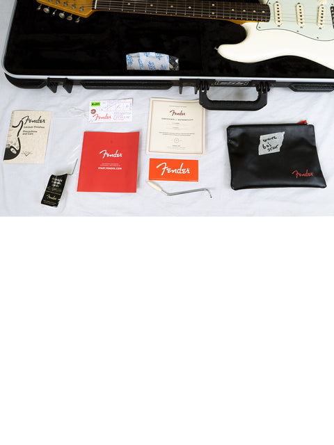 Fender Stratocaster electric guitar in Olympic White, '60s design with custom shop parts, made in the USA, 2020 model.