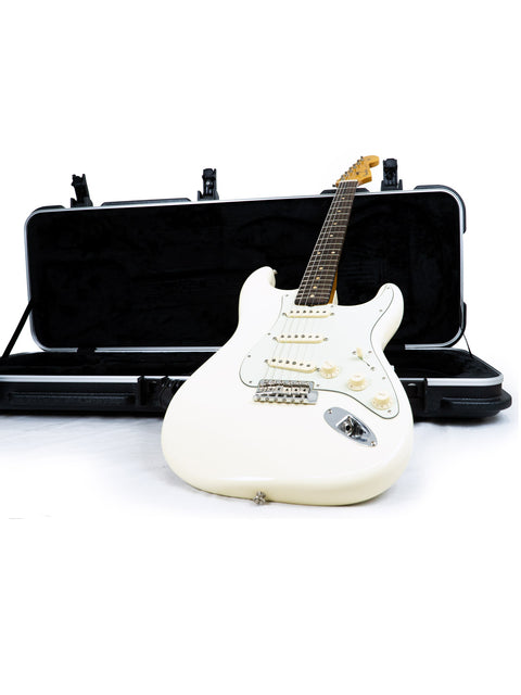 Fender Stratocaster in Olympic White, crafted with custom shop parts in the USA, showcasing a 1960s style.