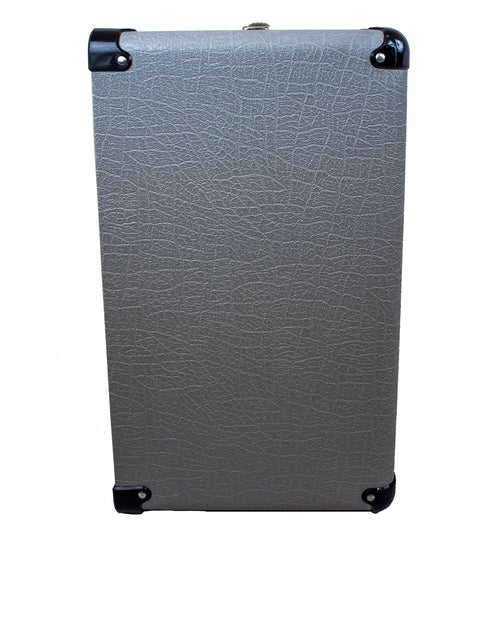 Gray and black suitcase showcasing a metal handle, ideal for travelers seeking functionality.