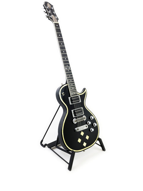 Greco Zemaitis GZ-2600IF black electric guitar on a stand, ideal for serious players looking to enhance their sound.