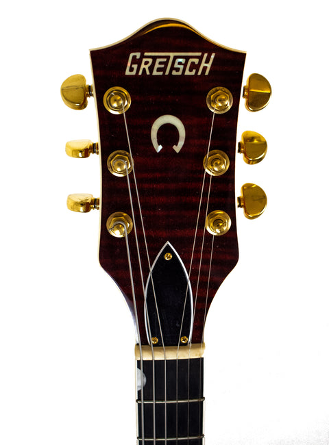 Gretsch G-400S electric guitar, Chet Atkins G6120, crafted in Japan in 2011, known for its iconic style and tone.