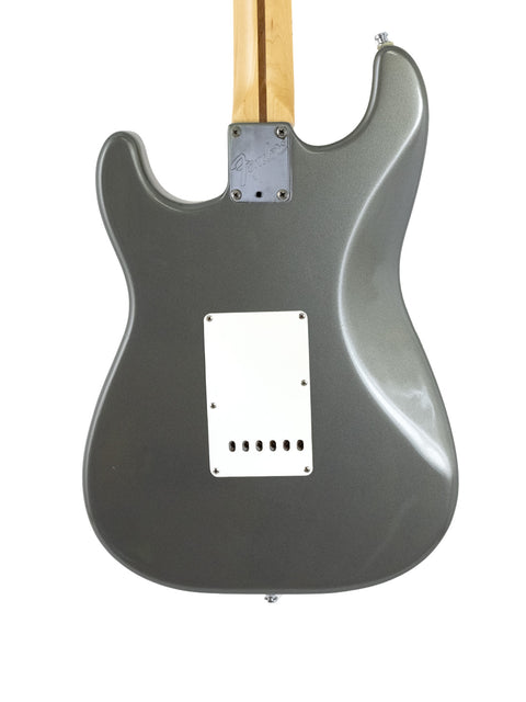 Grey Fender American Standard Stratocaster, featuring Eric Clapton's signature, crafted in the USA in 1988.