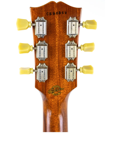 Headstock of a Gibson Custom Shop ES 339 acoustic guitar featuring four tuning knobs, showcasing its craftsmanship from 2009.