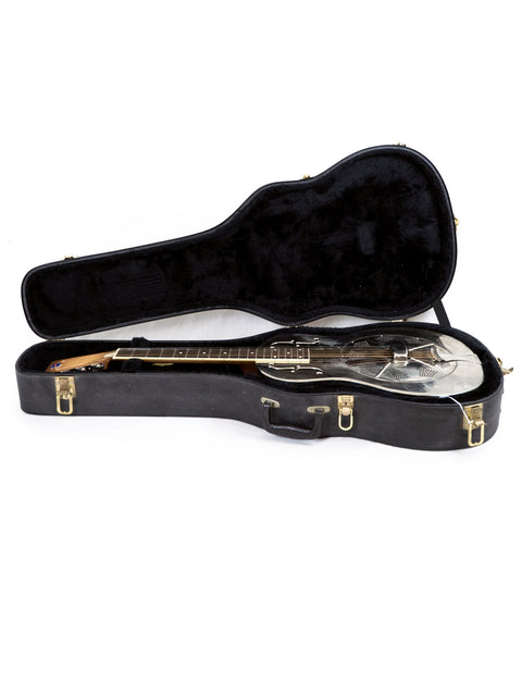 Inside a guitar case rests a National Resophonic Style N Resonator guitar, a fine example of USA craftsmanship from 2001.