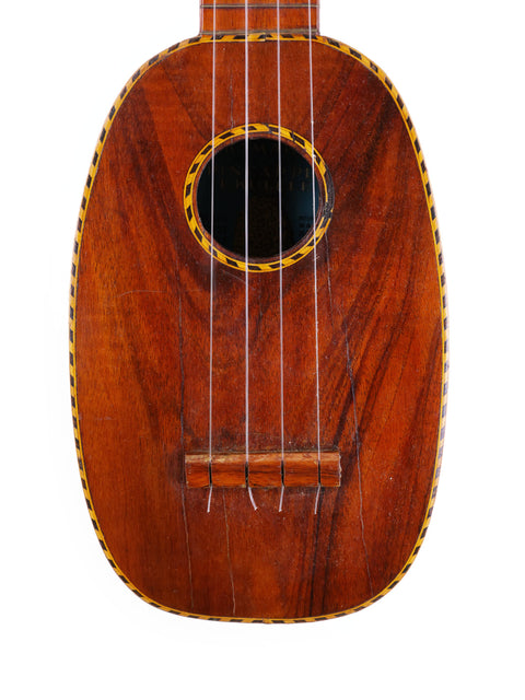 Kamaka Pineapple Style #3 ukulele, c. 1928, showcasing a rich wooden body and neck, perfect for music lovers.