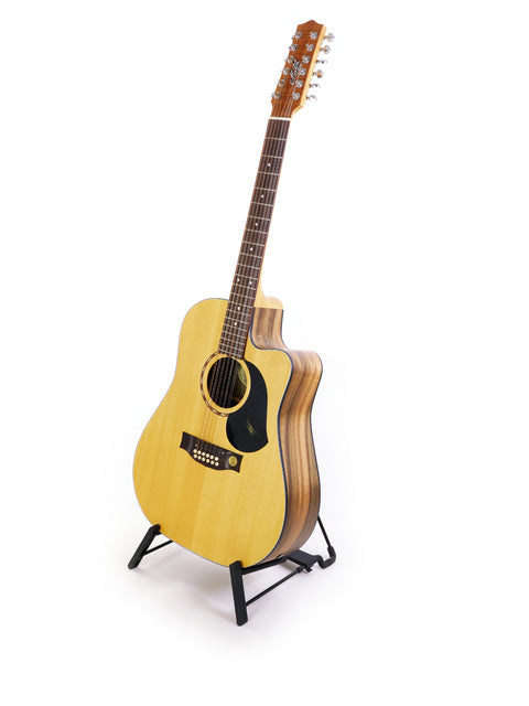 Maton EM425C 12-string guitar displayed on a stand, featuring a sleek design against a bright white backdrop.