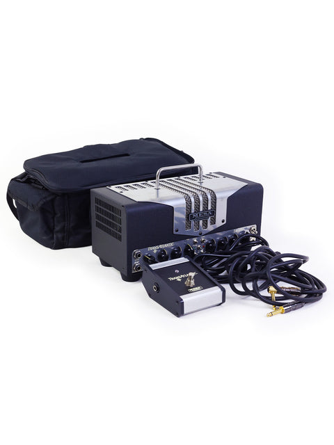 Mesa Boogie TA-15 amplifier in a carrying case, with cables included, designed for easy transport and setup.