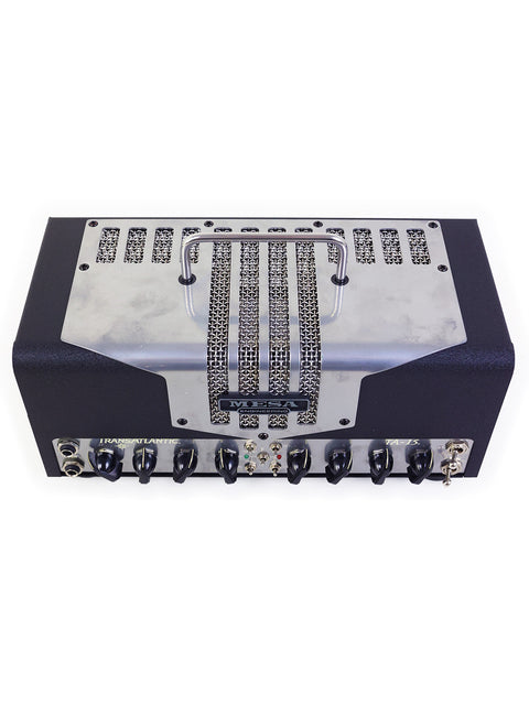 Mesa Boogie TA-15 amplifier in black and silver, featuring four control knobs, designed for high-quality guitar performance.