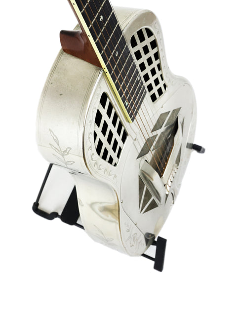 National Tricone Style 2 Roundneck guitar from 1931, resting on a black stand, set against a clean white background.