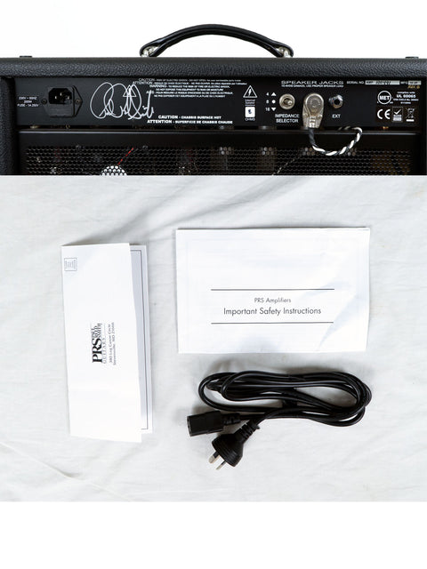 PRS Paul Reed Smith 30 Combo Amp (2010) with a power cord and a paper tag, showcasing its classic design.