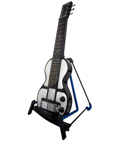 Rickenbacher Electro Lap Steel guitar from the 1930s, elegantly positioned on a stand against a white background.