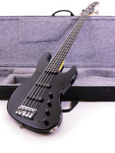 Sadowsky NYC Jazz Bass 5 String guitar in black, securely placed in a case with a white background.