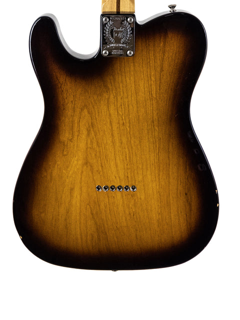 Showcasing a sunburst Fender American Vintage ’58 Telecaster, this image captures the essence of its 2012 special edition design.