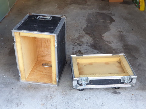 Side view of two Mesa Boogie Mark III amplifier cases from 1987 resting on the ground, emphasizing their iconic design and craftsmanship.