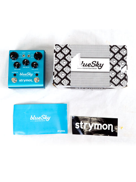 Strymon Blue Sky Reverb Pedal displayed under a bright blue sky, highlighting its modern features and aesthetic appeal.