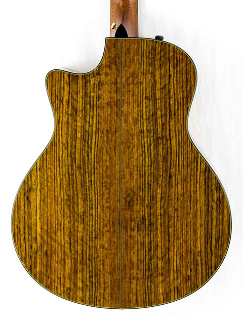 Stunning wooden back of a 2011 Taylor Custom GS Baritone 6 acoustic guitar, emphasizing its elegant design.