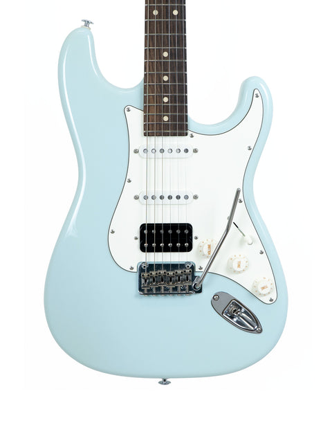 Suhr Classic Pro electric guitar in blue with a white pickguard, USA, 2018, highlighting its stylish and modern look.