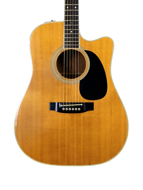 Takamine EF 360SC guitar, made in Japan in 1988, set against a simple white backdrop.