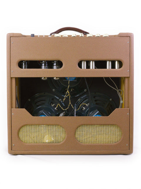 Tan guitar amplifier with a brown case, featuring the Victoria Victorilux 3x10 Combo from the USA, 2005.