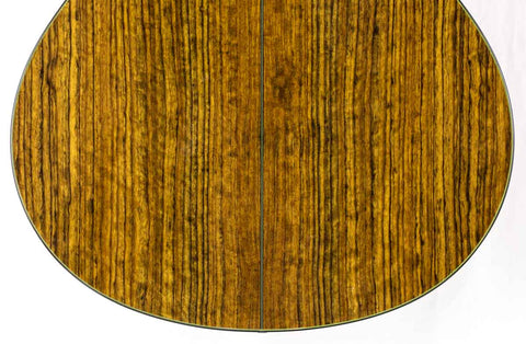 Taylor Custom GS Baritone 6 from 2011, featuring a gorgeous wooden top and back, ideal for acoustic performances.