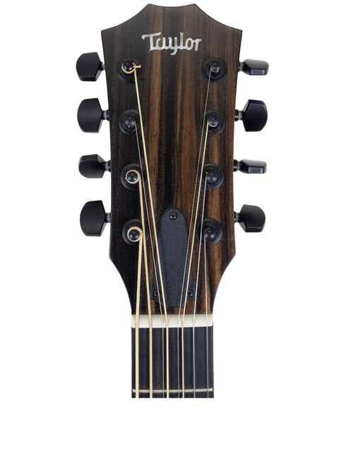 Taylor guitar headstock with the brand name visible, model 326 CE Baritone 8 LTD, crafted in the USA, 2020 edition.