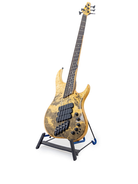 The Dingwall Z3 Buckeye Custom 5 String Bass guitar displayed on a stand, set against a pristine white backdrop for emphasis.