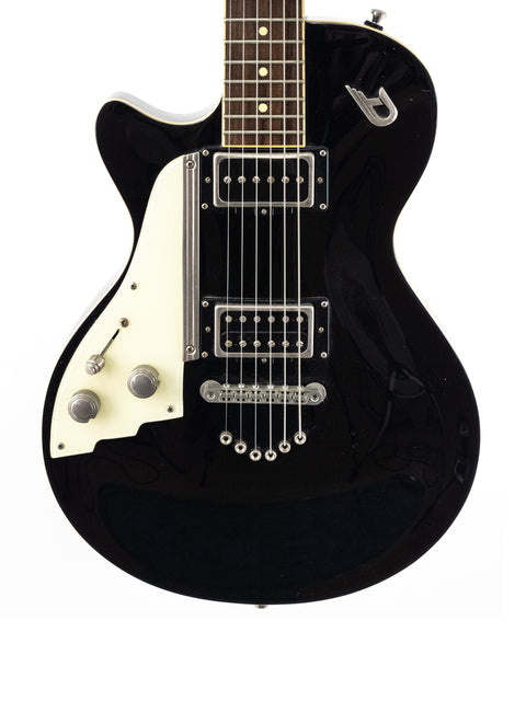 The Duesenberg 49er Solid Body guitar features a striking black finish and a classic white pickguard, perfect for musicians.