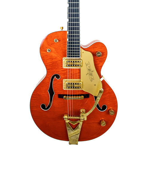 The Gretsch G-60S electric guitar features a stunning design, highlighting its quality and craftsmanship from Japan, 2011.