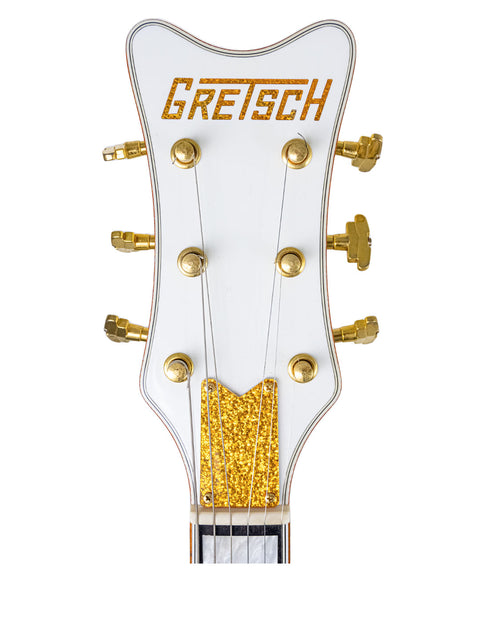 The Gretsch GX-1 electric guitar, featuring a stylish body and unique color, ideal for rock and roll performances.