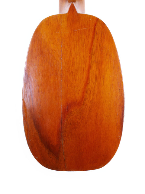 The Kamaka Pineapple Style #3 ukulele from 1928, made entirely of wood, highlighting its classic craftsmanship.