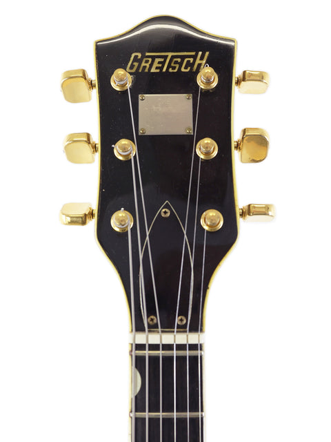 The headstock of a 1967 Gretsch 6122 Chet Atkins Country Gentleman guitar, showcasing its classic design and craftsmanship.