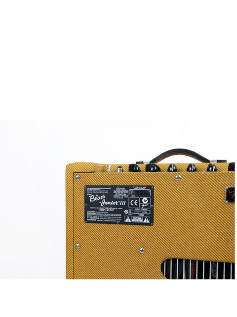 The image displays a Fender Blues Junior III Limited Edition amplifier, 2012 model, adorned with a striking yellow cover.