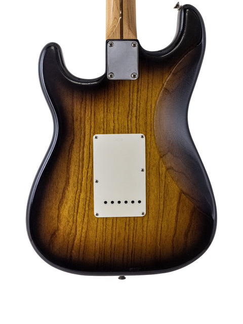 The image features a Fender American Standard Stratocaster with a beautiful maple sunburst, highlighting its elegant curves and details.