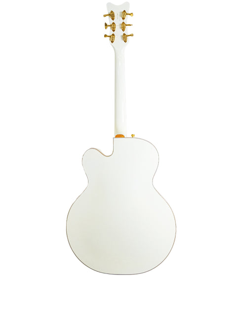 The image features a white Gretsch G7593 White Falcon guitar, distinguished by its gold headstock, crafted in Japan, 2012.