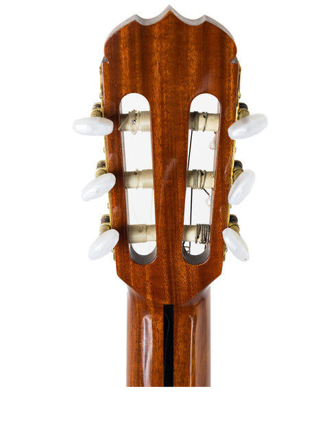 The neck of a 1987 K Yairi YC90 Concert Classical Guitar displayed on a clean white background, highlighting its craftsmanship.