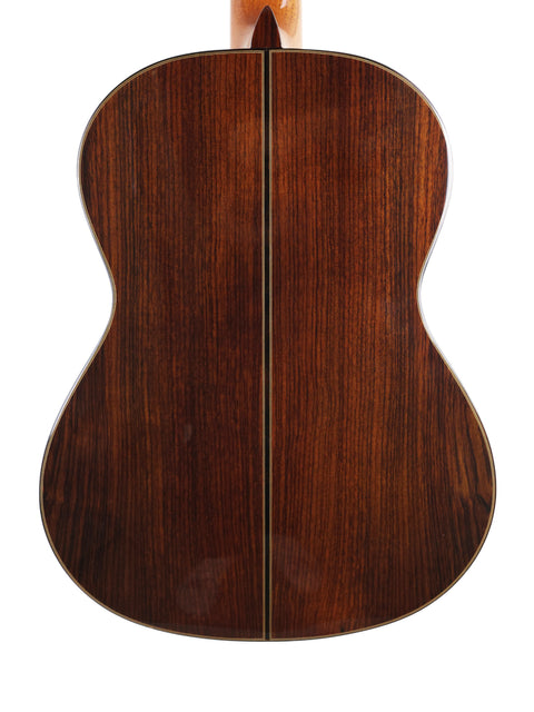 The wooden back of a Ramirez 4NE acoustic guitar, highlighting its craftsmanship from Spain, made in 2012.