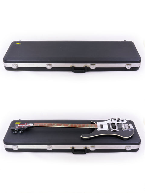 Two bass guitars, one a Rickenbacker 4003 Jetglo, neatly arranged in a case with a white backdrop.