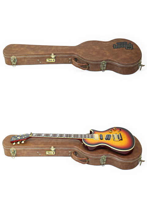 Two guitars, a Gibson Nighthawk from 1997, resting in a case against a clean white background.