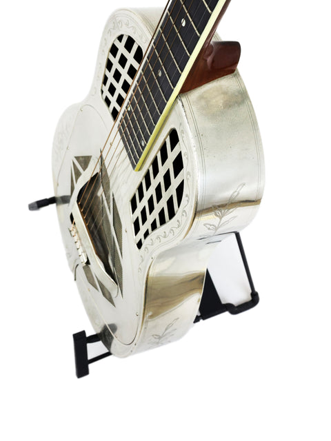Vintage 1931 National Tricone Style 2 Roundneck guitar displayed on a black stand with a white backdrop.