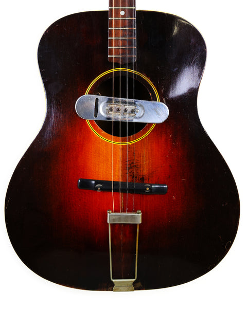 Vintage 1951 Gibson J-45 sunburst acoustic guitar, perfect for collectors and musicians seeking classic sound and style.