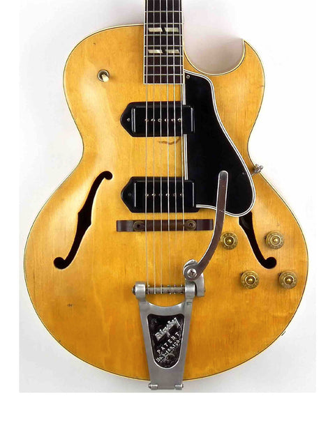 Vintage 1953 Gibson ES 175 DN guitar in yellow with a black pickup, showcasing classic design and craftsmanship.