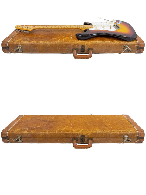 Vintage 1958 Fender Stratocaster, known for its sunburst finish and legendary sound, a true collector's item.