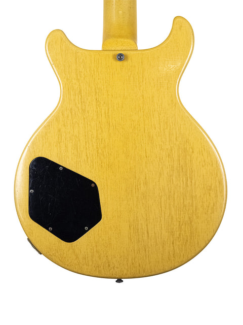 Vintage 1958 Gibson Les Paul Special guitar in yellow, equipped with a black pickguard and a stylish double cut design.
