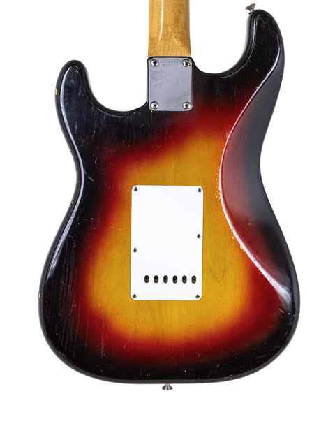 Vintage 1964 Fender Stratocaster featuring a sunburst finish, representing a timeless piece of American music history.