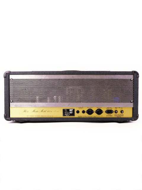 Vintage 1982 Marshall JCM800 2204 guitar amplifier in yellow and black, set against a clean white background.