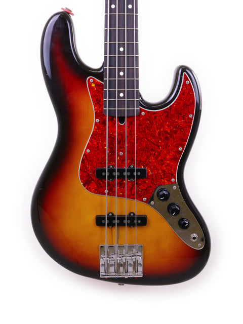 Vintage 1986/87 Fender Jazz Bass with a beautiful sunburst finish, highlighting its classic design and musical heritage.