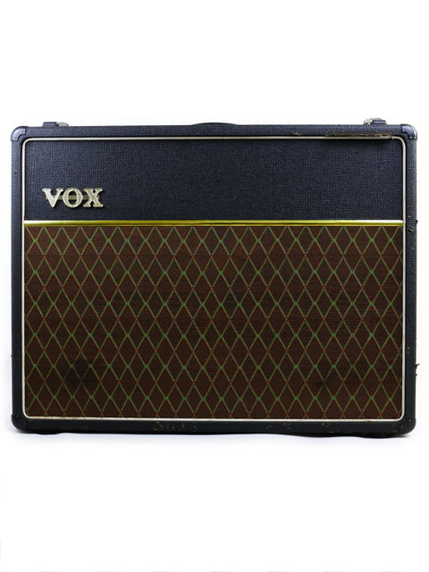 Vintage 1997 Vox AC30 6TB Combo Amplifier, known for its iconic sound and stylish design, ideal for musicians.