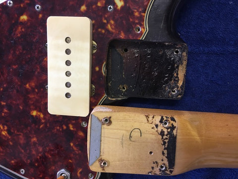 Vintage Fender Jazzmaster from 1960, USA, displaying a pickup and pickup cover, exemplifying iconic guitar craftsmanship.