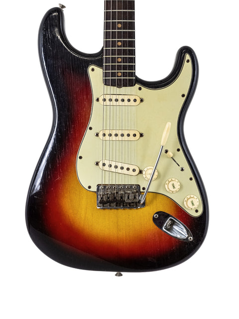 Vintage Fender L Series Stratocaster in sunburst finish, showcasing its classic design and rich color from 1964.